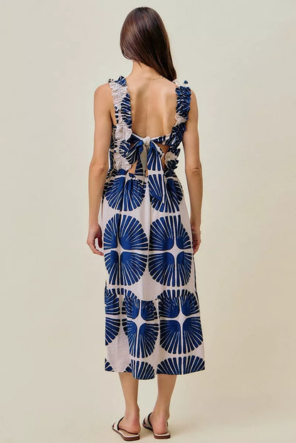 Navy SO ME abstract print midi dress with smocked bodice, tiered design, and lined fabric, perfect for casual and summer wear.