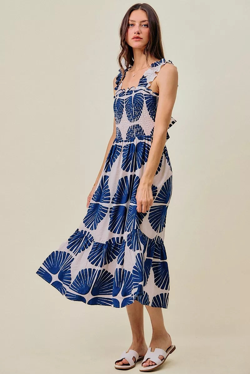 Navy SO ME abstract print midi dress with smocked bodice, tiered design, and lining, styled by Trendsi.