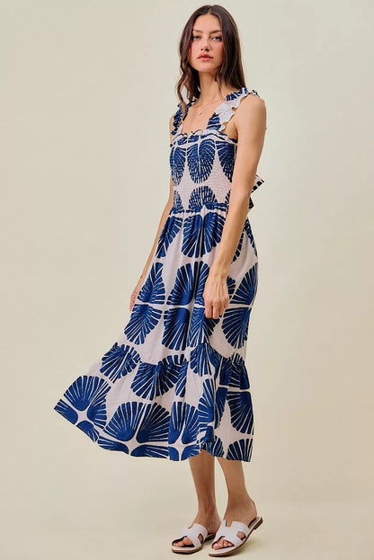Navy SO ME abstract print midi dress with smocked bodice, tiered design, and lining, styled by Trendsi.