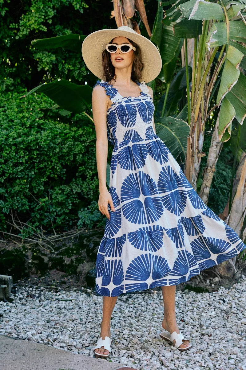 Navy SO ME abstract print smocked bodice tiered lined midi dress by Trendsi, showcasing its flowy tiered design and smocked top.