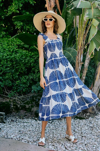 Navy SO ME abstract print smocked bodice tiered lined midi dress by Trendsi, showcasing its flowy tiered design and smocked top.