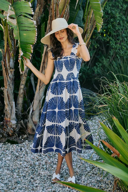 Navy SO ME abstract print midi dress with smocked bodice, tiered design, and lining, perfect for casual or semi-formal wear.