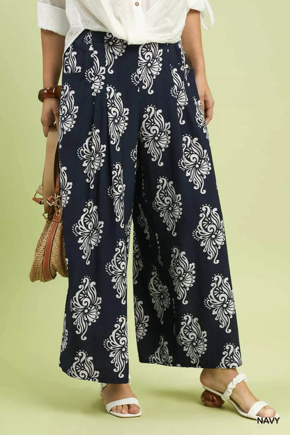 Navy abstract print wide-leg pants by Umgee featuring flowy fabric and relaxed fit for casual or stylish wear.
