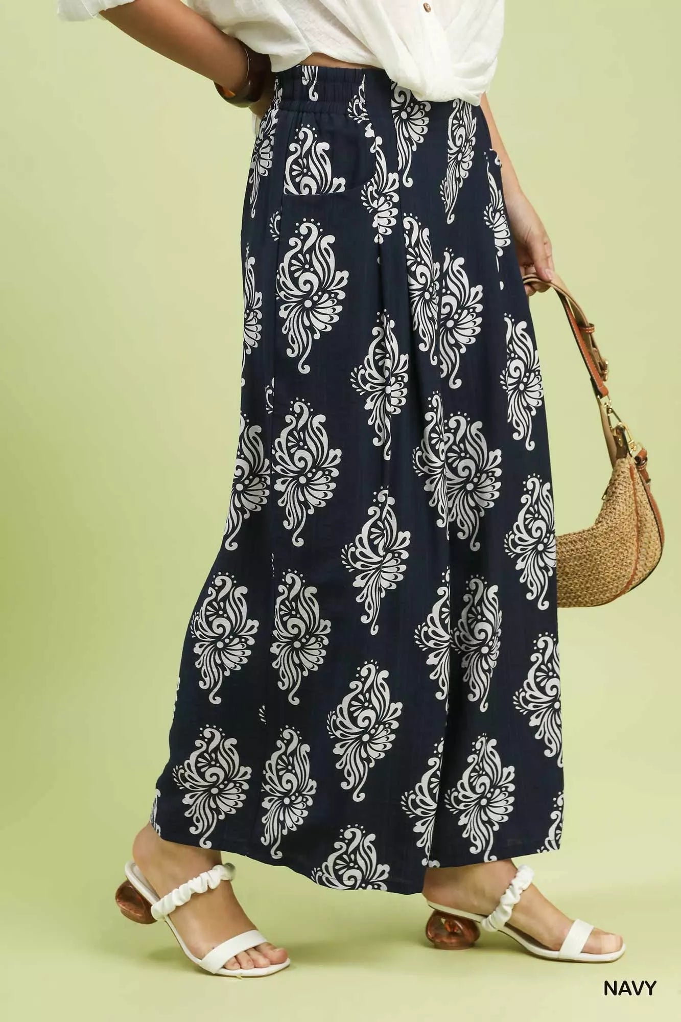 Navy abstract print wide-leg pants by Umgee, featuring flowy fabric and relaxed fit, perfect for casual or stylish outfits.