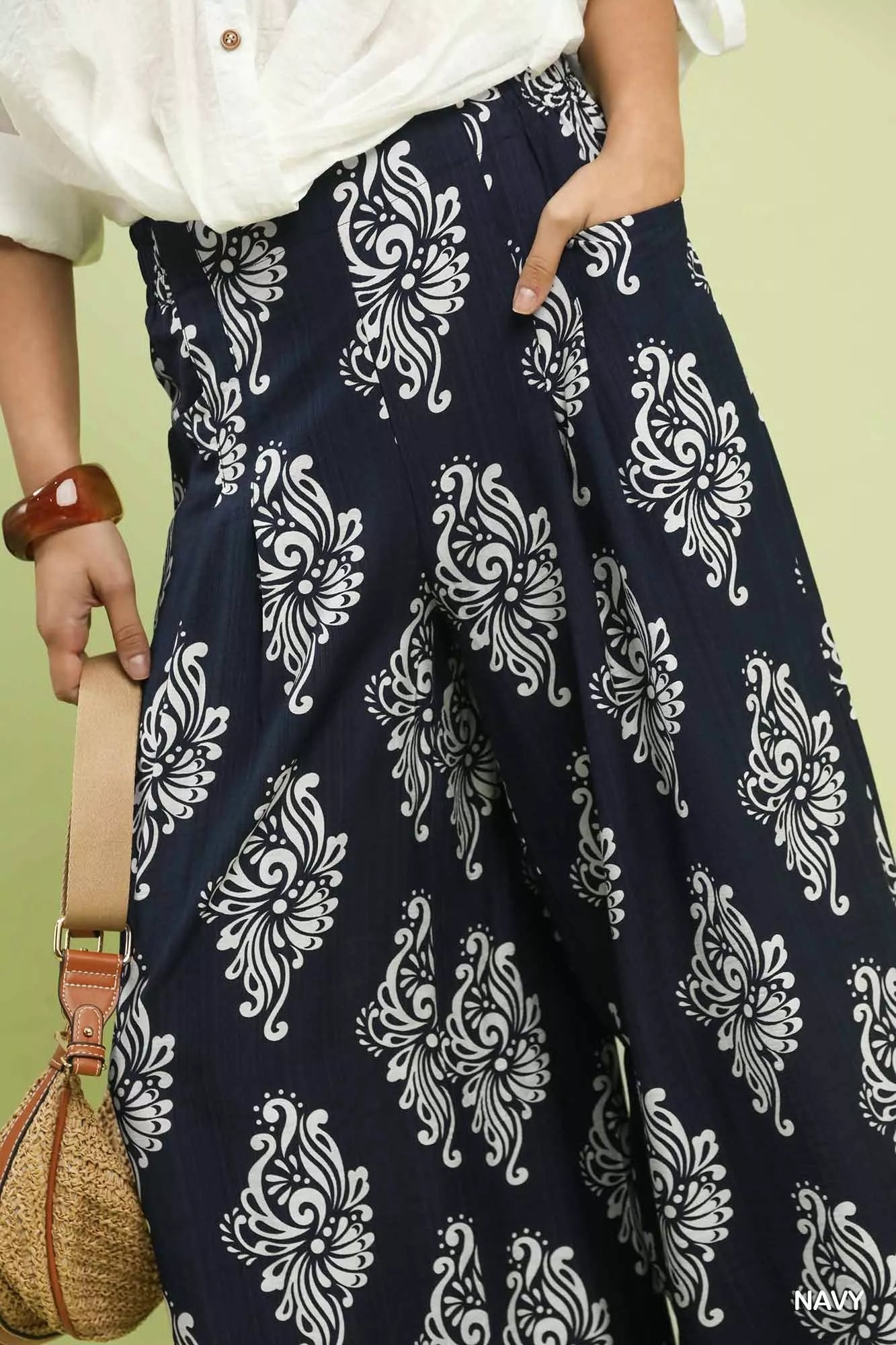 Navy abstract print wide-leg pants by Umgee, featuring a flowing silhouette and relaxed fit, perfect for casual or chic looks.
