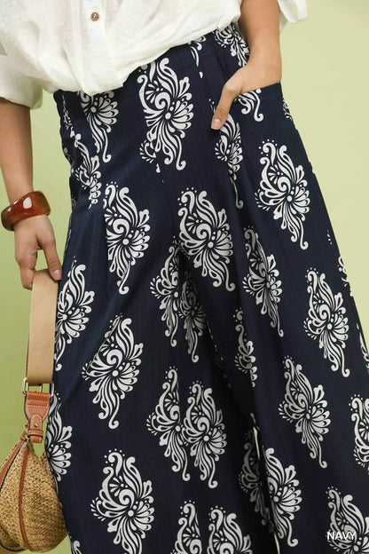 Navy abstract print wide-leg pants by Umgee, featuring a flowing silhouette and relaxed fit, perfect for casual or chic looks.