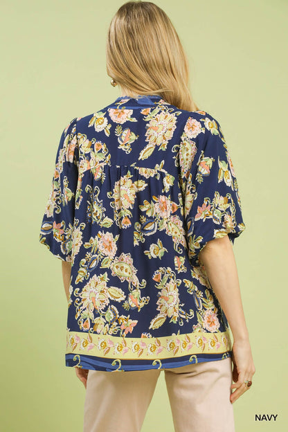 Navy Umgee floral boho blouse with apricot flower pattern, long sleeves, and relaxed fit, perfect for casual and bohemian style.