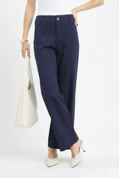 Navy Umgee button-stretched pants by Trendsi, featuring a relaxed fit and stylish design, shown in a natural sitting pose.