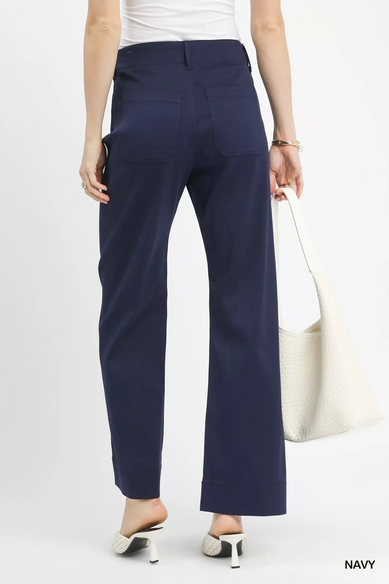 Navy Umgee button-stretched pants from Trendsi, featuring a comfortable fit and stylish design, shown on a model.