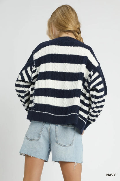 Navy Umgee cable-knit stripe button-up cardigan with front buttons, styled with a cozy, casual look.