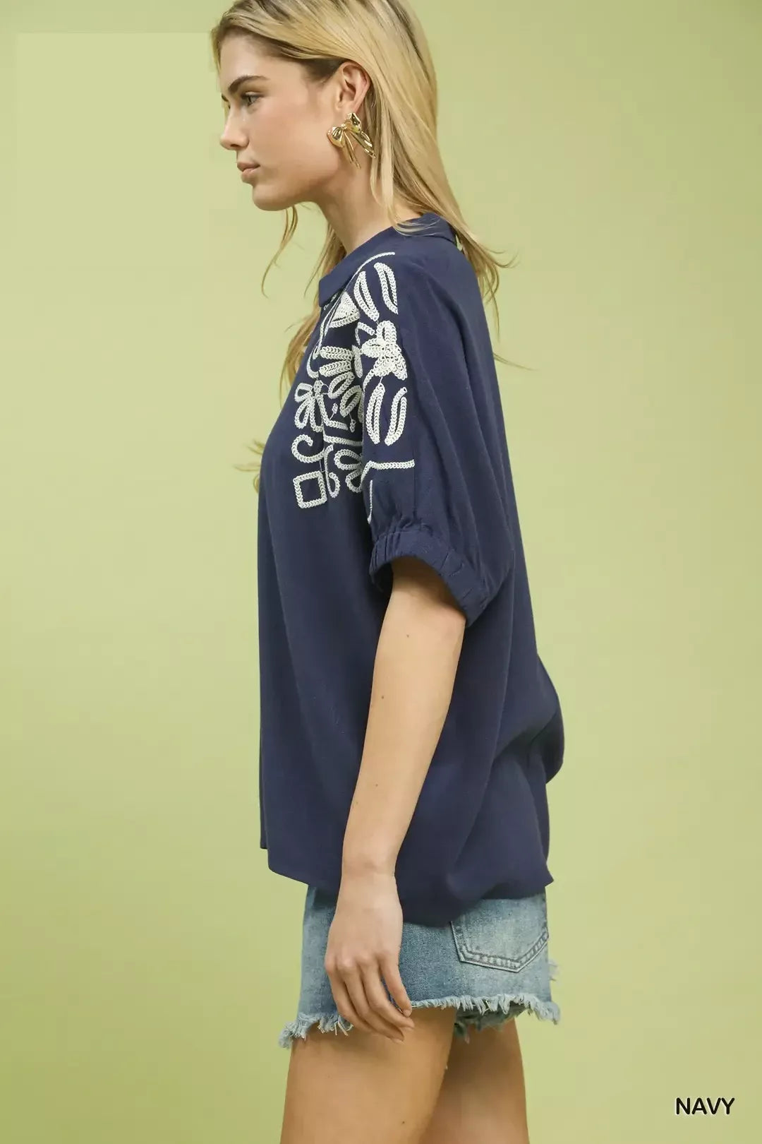 Navy floral embroidered sleeve blouse by Umgee featuring lightweight fabric and feminine design.