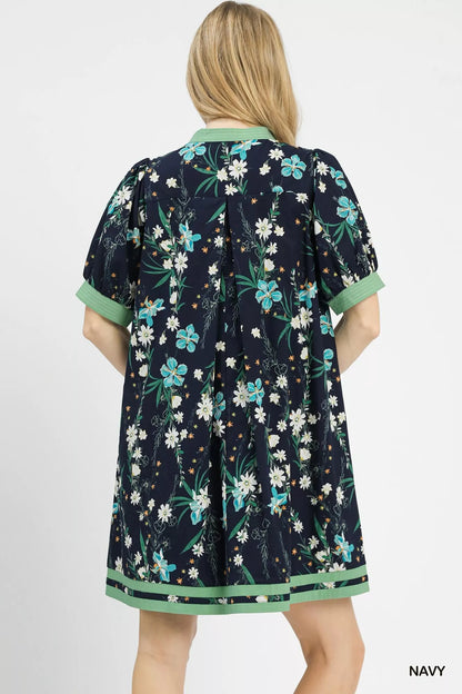 Navy floral puff sleeve dress with contrast trim by Umgee, featuring a feminine silhouette and detailed sleeve design.