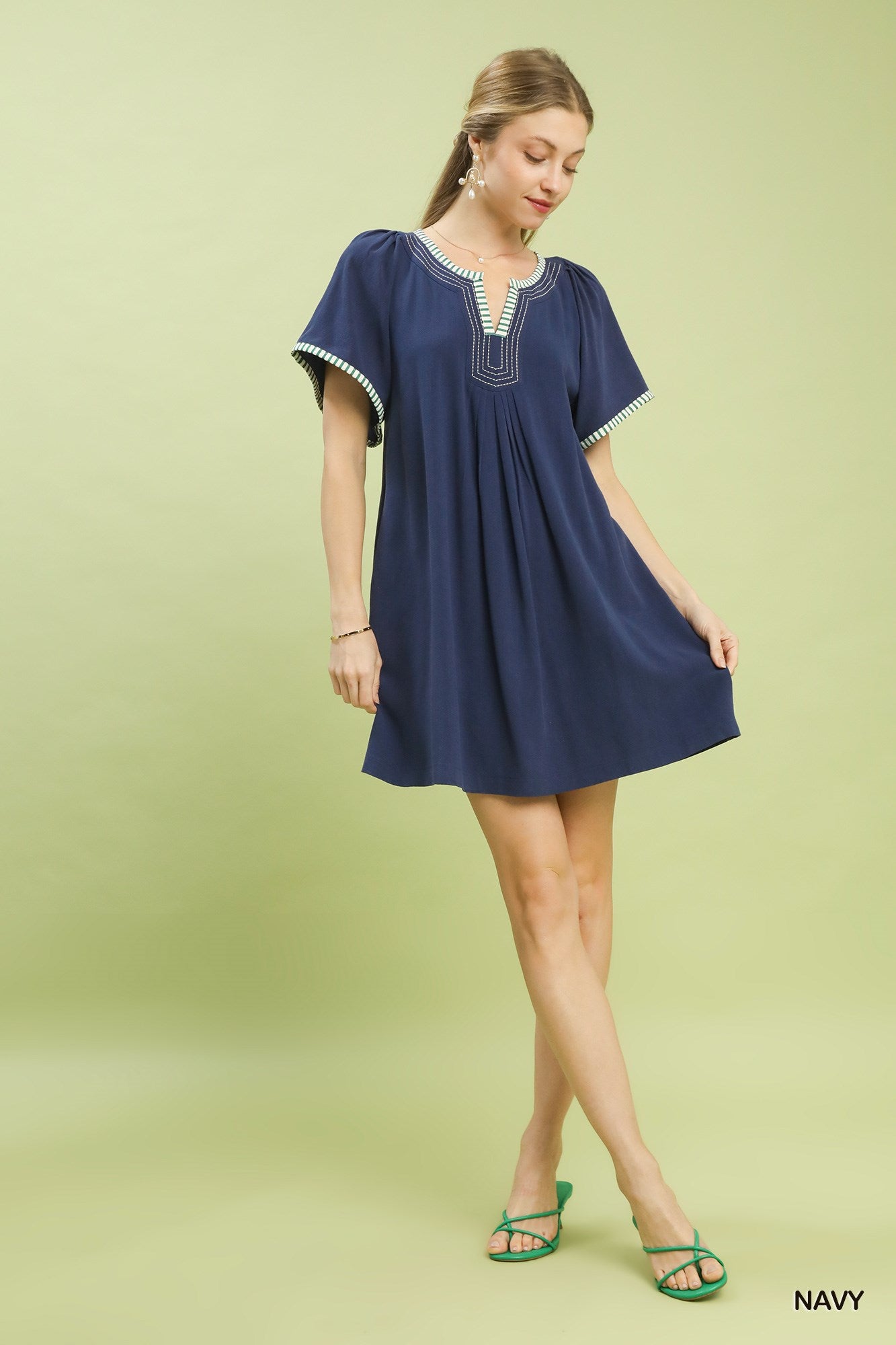Navy Umgee linen trim tunic dress with relaxed fit and long sleeves, casual summer style perfect for warm weather.