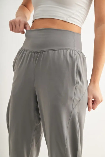 Trendsi MONO B Flowbarrel high-waist active pants in pewter, featuring a sleek fit and comfortable design for active wear.