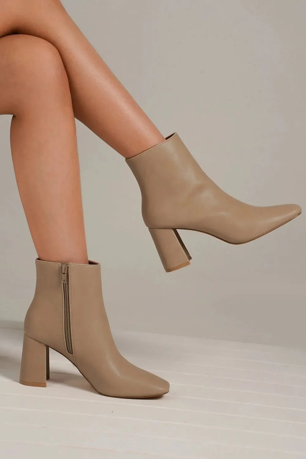 Beast Fashion PU leather block heel boots with side zippers, nude color, stylish women's footwear, trendy and comfortable design.