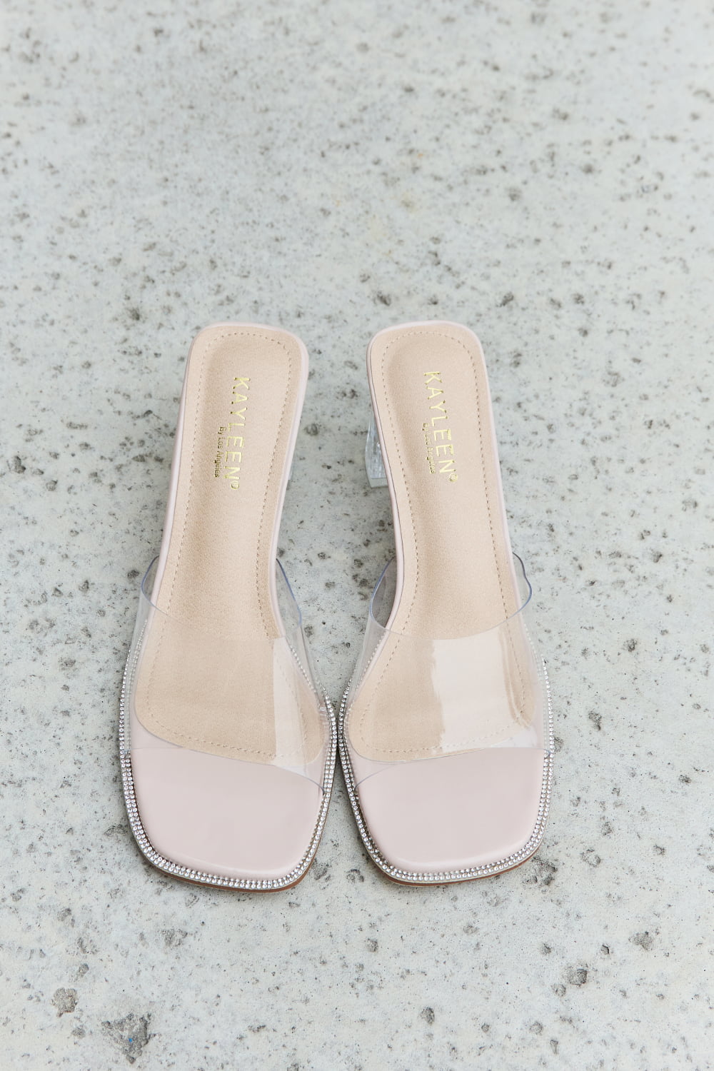 Nude DDK Make Myself Clear mule block heels by Trendsi, featuring a stylish open-toe design and comfortable block heel.