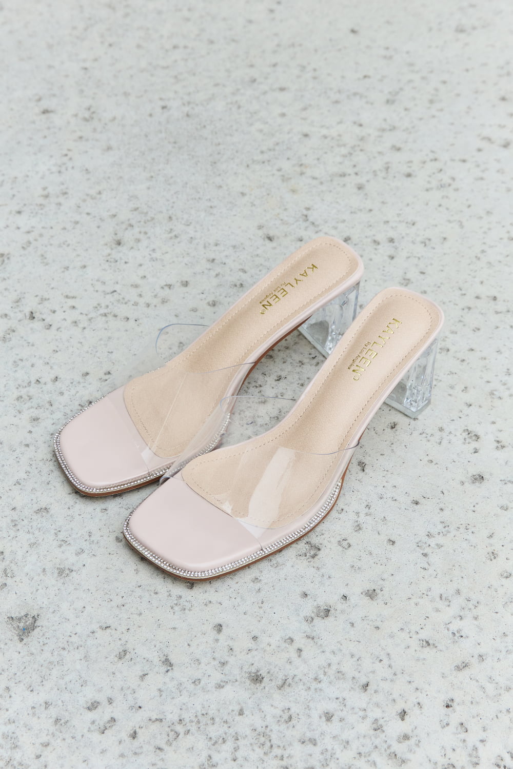 Nude DDK Make Myself Clear mule block heels by Trendsi, featuring a stylish open-toe design and sturdy block heel.