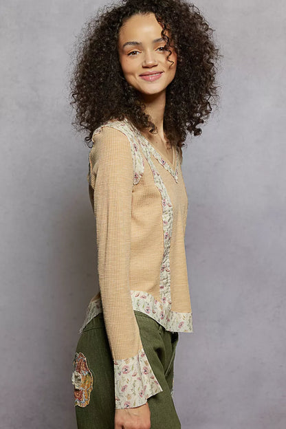 Nude beige POL floral patch V-neck long sleeve ribbed top by Trendsi, featuring floral embroidery on soft, fitted knit fabric.