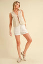 Aemi+Co embroidered tied front vest coat in oat color with intricate embroidery, stylish and lightweight for versatile layering.