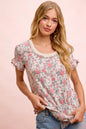 Oatmeal coral BiBi Rose printed slub knit top with ruffled sleeves, styled by Trendsi, featuring a relaxed fit and floral pattern.
