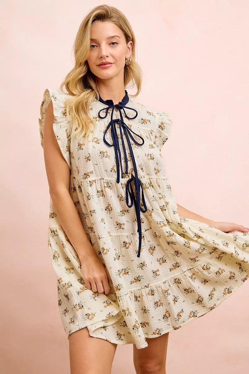 Oatmeal navy BiBi floral multi-tiered dress with ruffles and front tie, trendy women's dress by Trendsi.
