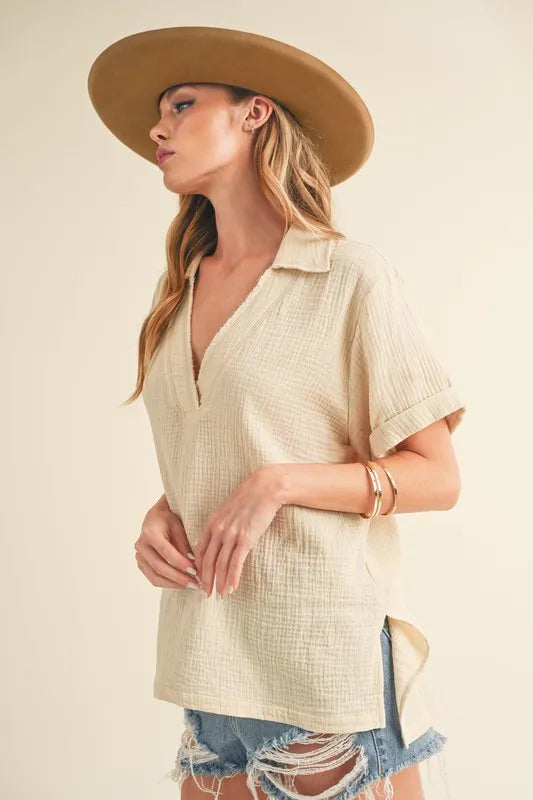 Aemi + Co oatmeal cotton gauze blouse with side slit and Johnny collar, short sleeves, stylish and breathable for casual wear.