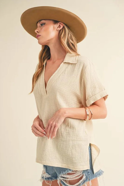 Aemi + Co oatmeal cotton gauze blouse with side slit and Johnny collar, short sleeves, stylish and breathable for casual wear.