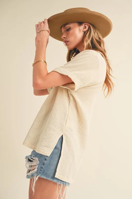 Oatmeal Aemi + Co cotton gauze blouse with side slit, Johnny collar, short sleeves, stylish and lightweight for casual wear.