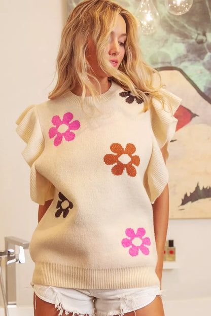 Oatmeal BiBi flower printed ruffled sleeves top by Trendsi, showing the floral design and stylish ruffle details on the sleeves.