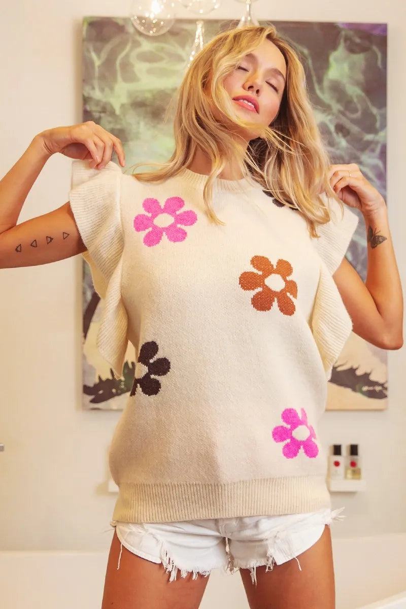 Oatmeal BiBi Flower printed ruffled sleeves top by Trendsi with floral pattern and feminine ruffle details on sleeves.