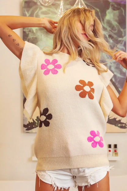 Oatmeal BiBi flower printed ruffled sleeves top by Trendsi, featuring a feminine design with floral print and ruffled sleeve details.