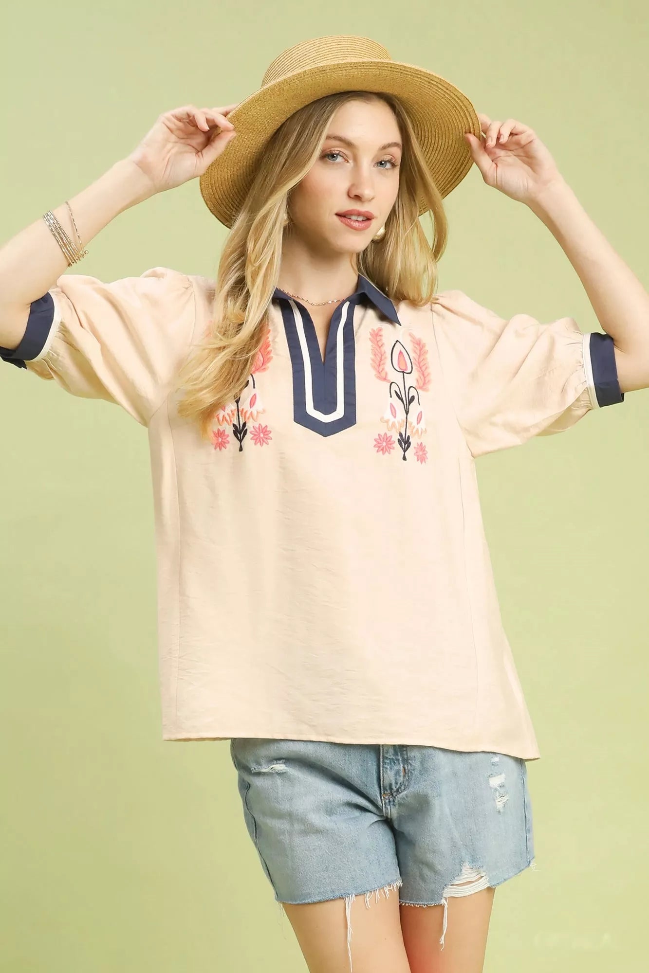 Oatmeal Umgee embroidered puff sleeve top with contrast trim, featuring intricate embroidery and stylish puff sleeves.