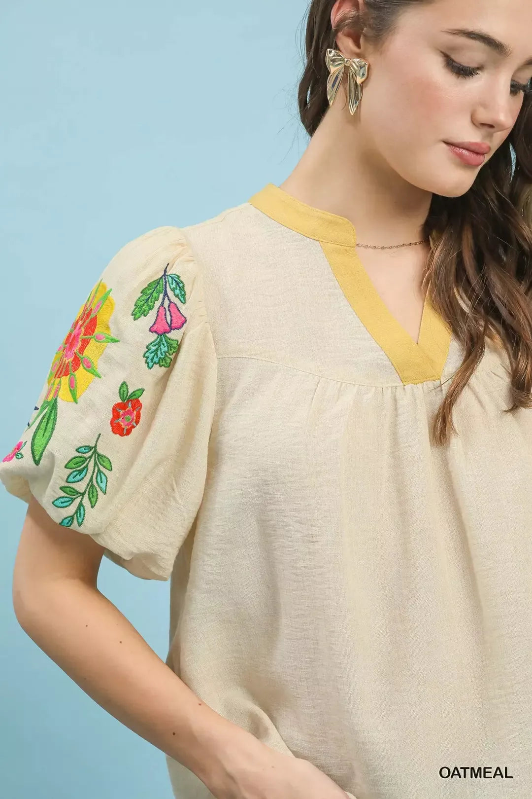 Oatmeal Umgee embroidered puff sleeve top with detailed embroidery and billowy sleeves, stylish and casual women's blouse.