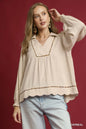 Plus size Umgee linen blouse with scallop hem and contrast trim, featuring a relaxed fit in oatmeal color.