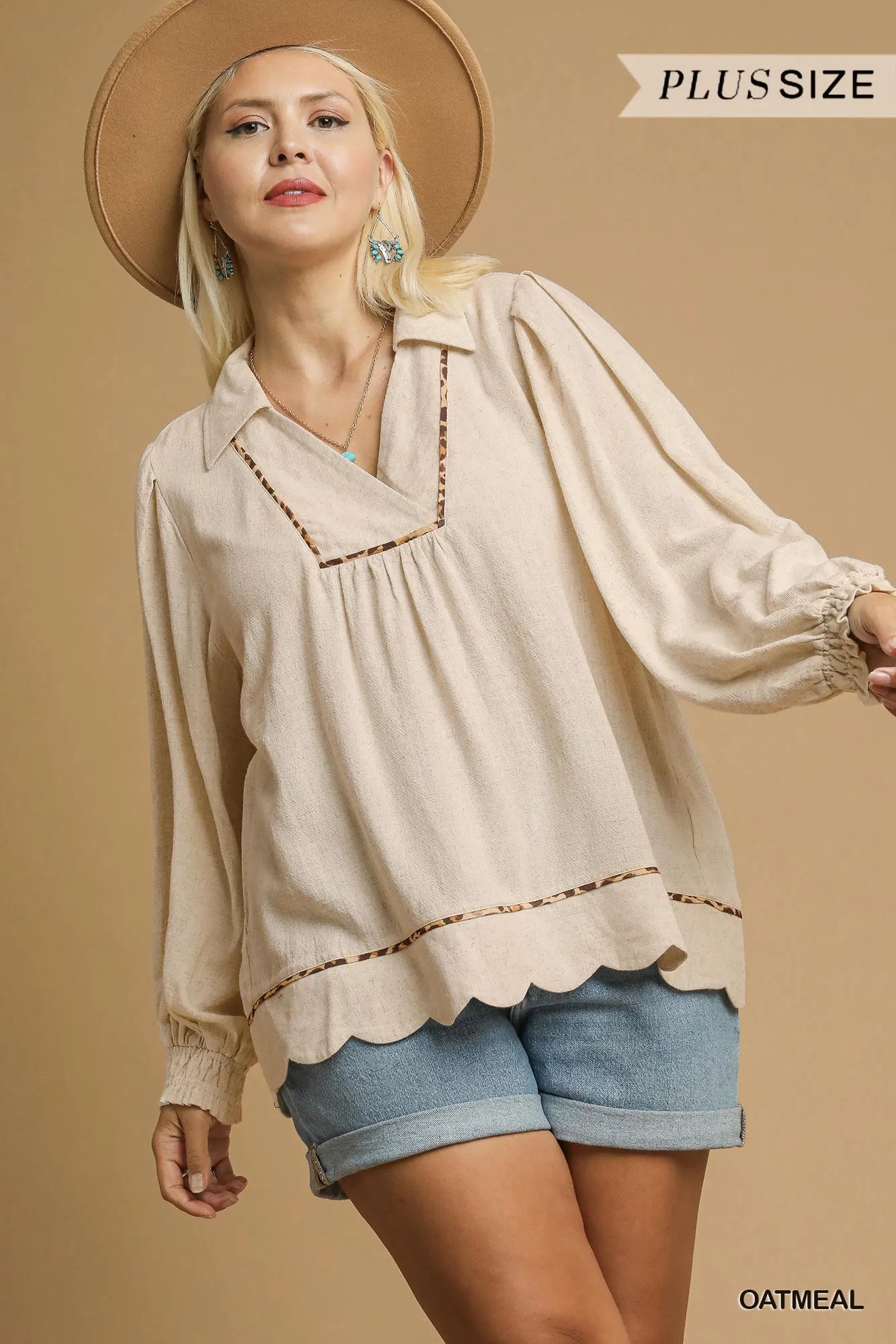 Plus size Umgee linen blouse with scallop hem and contrast trim, featuring a relaxed fit and oatmeal color.