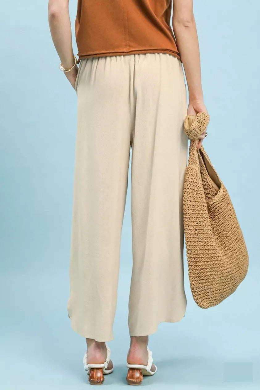 Oatmeal Umgee linen embroidered wide-leg boho pants with relaxed fit and intricate embroidery, perfect for casual or bohemian style.