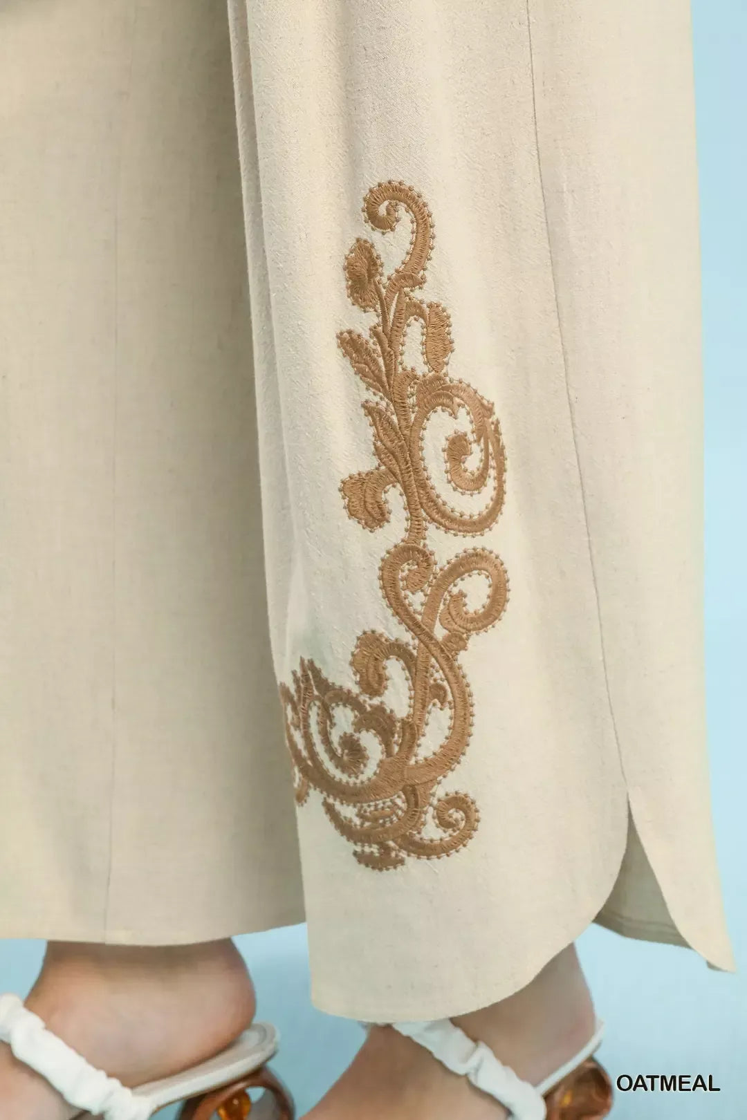 Oatmeal linen embroidered wide-leg boho pants by Umgee featuring relaxed fit and intricate embroidery details.