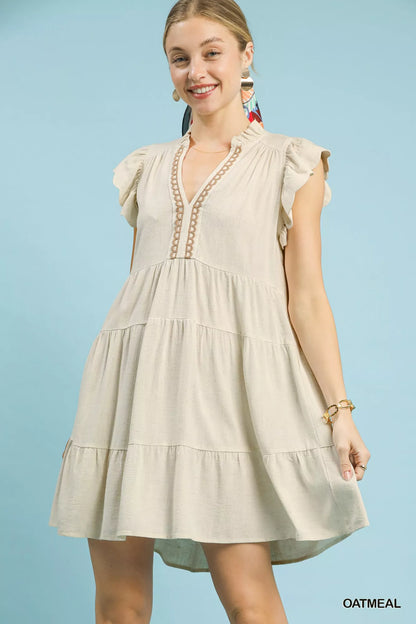 Oatmeal Umgee linen tiered baby doll dress with a relaxed fit, featuring ruffled tiers and sleeveless design.