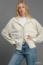 Oatmeal Umgee two-way jacquard zip-up jacket with textured pattern and front zipper, stylish and versatile for casual wear.