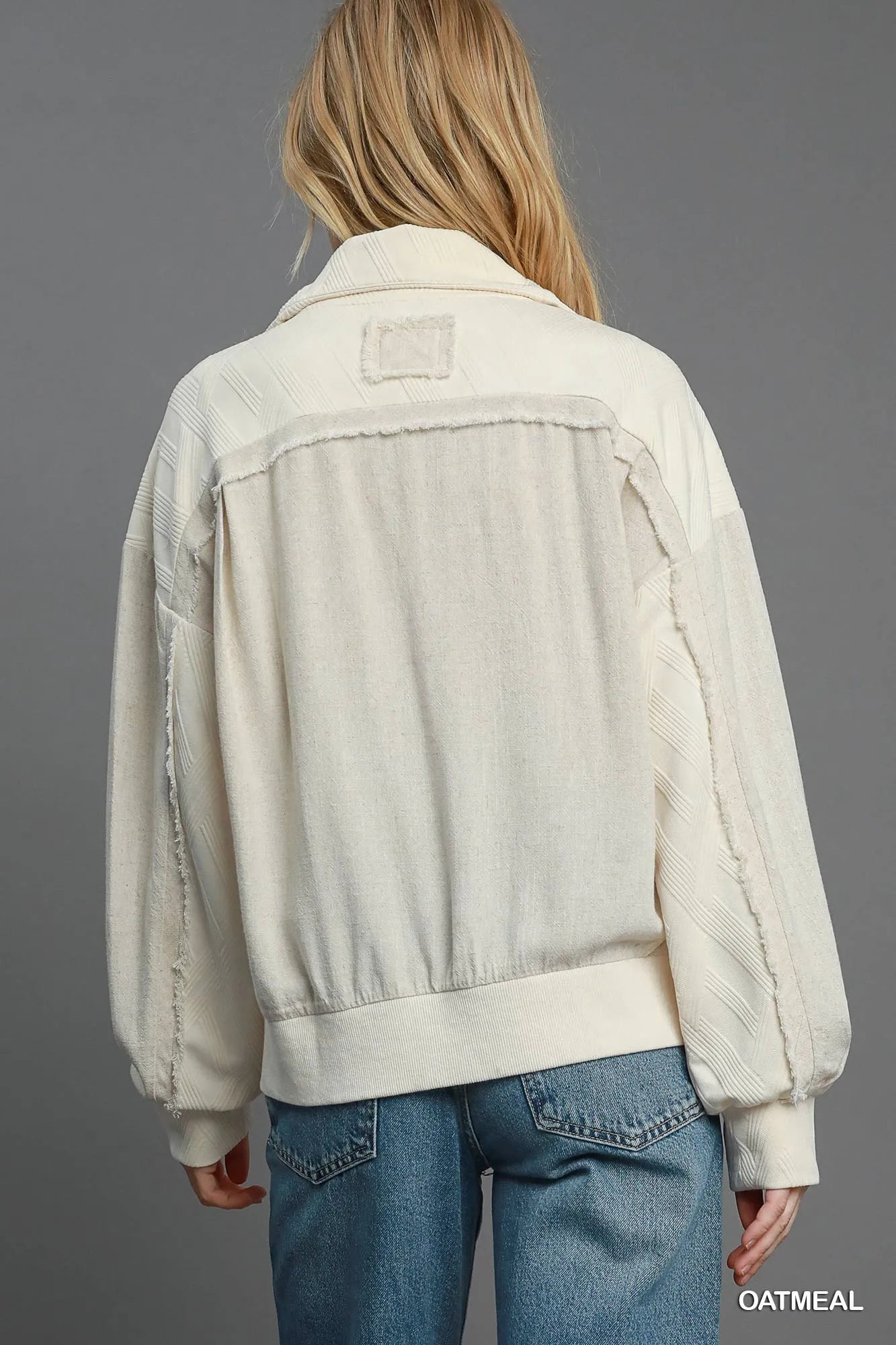 Oatmeal Umgee Two-Way Jacquard Zip-Up Jacket, front view showing textured fabric and zip closure, casual stylish outerwear.