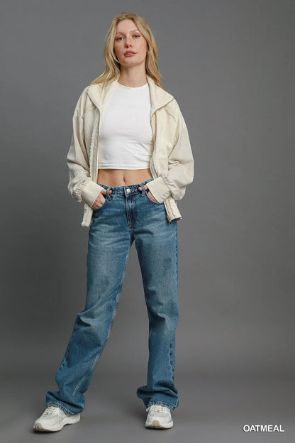 Oatmeal Umgee Two-Way Jacquard Zip-Up Jacket with textured pattern, front zipper, and collar, shown on a model.