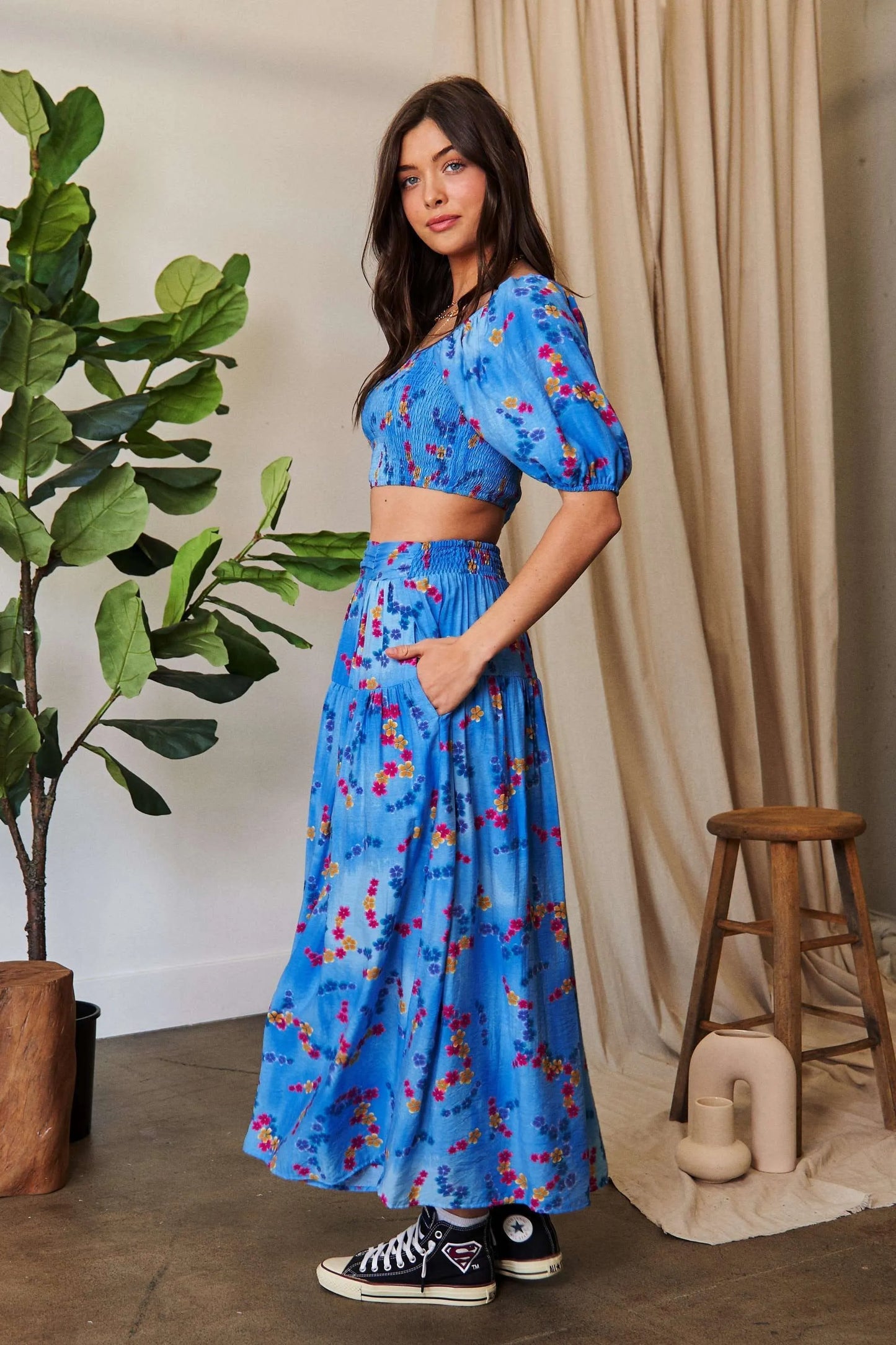 Ocean blue Davi & Dani printed smocking waistband ruffled maxi skirt, flowy and stylish for warm weather.
