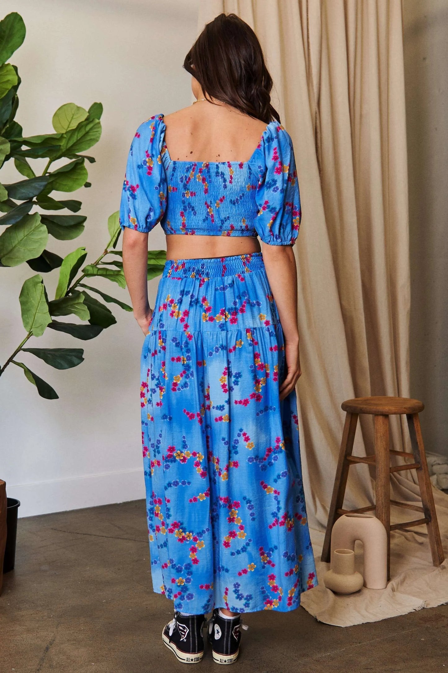Ocean blue Davi & Dani printed smocking waistband ruffled maxi skirt with flowing fabric, perfect for casual or dressy summer wear.