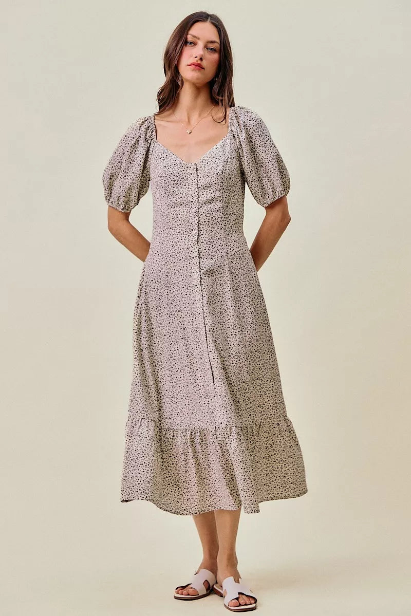 Off-white and black SO ME Ditsy Floral Maxi Dress with self belt and elastic waist, featuring a flowy, floral pattern.