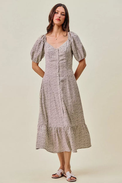 Off-white and black SO ME Ditsy Floral Maxi Dress with self belt and elastic waist, featuring a flowy, floral pattern.