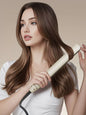 Off-white Trendsi fast heating hair straightener with European plug, sleek design, and ceramic plates for smooth styling.