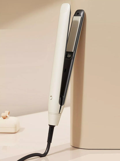 Off-white Trendsi fast heating hair straightener with European plug, sleek design, and ceramic plates for smooth styling.