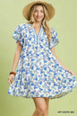 Off-white floral tiered dress with flutter sleeves by Umgee, featuring a feminine, flowy design perfect for casual or special occasions.