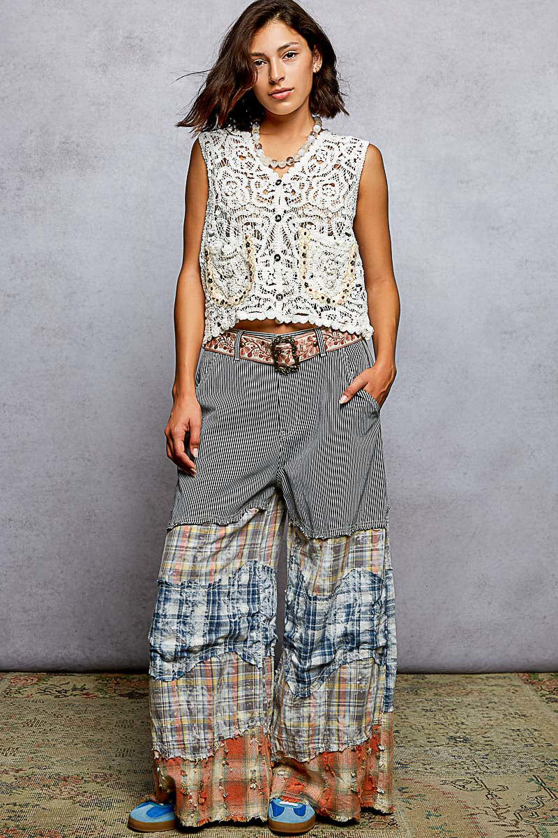 Off-white Trendsi cropped crochet vest with button-down front and scalloped edge, stylish and lightweight for layered looks.