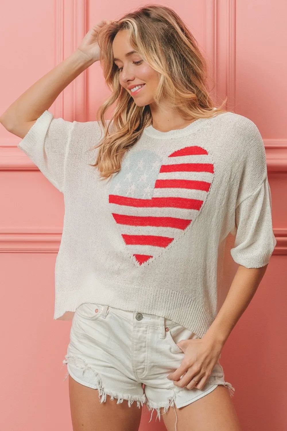 Off-white BiBi striped knit top with contrasting heart pattern from Trendsi, featuring a cozy, casual style.